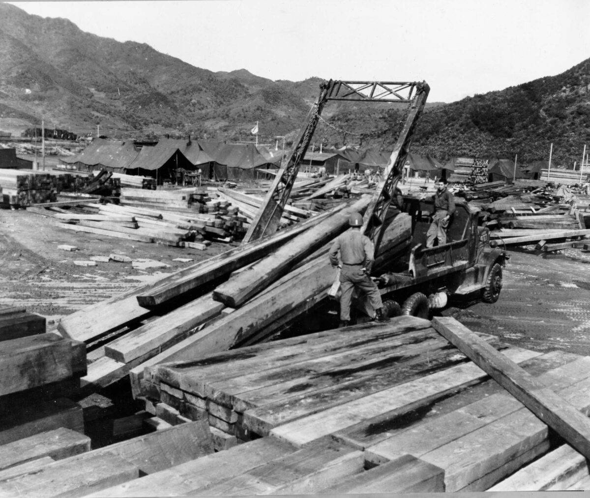 Photograph collection depicts logistics operations within the course of wartime